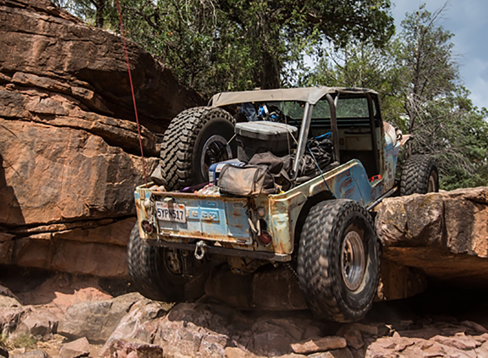 cummins repowered 1971 jeep UACJ-6D crawling over rocks