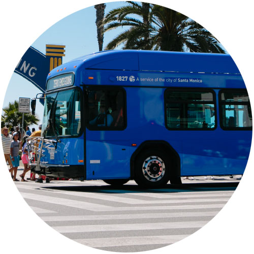 electric transportation bus moves through intersection