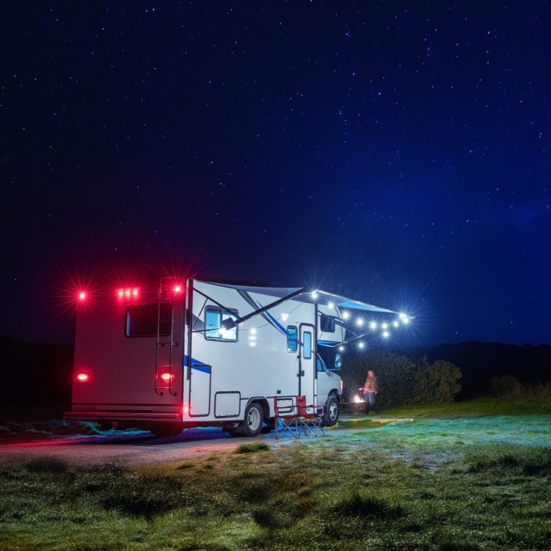 rv camping at night with lights on