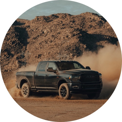 ram truck driving in desert