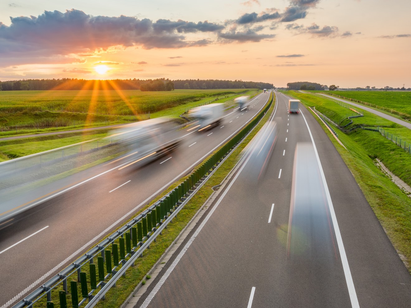 trucks in motion on highway