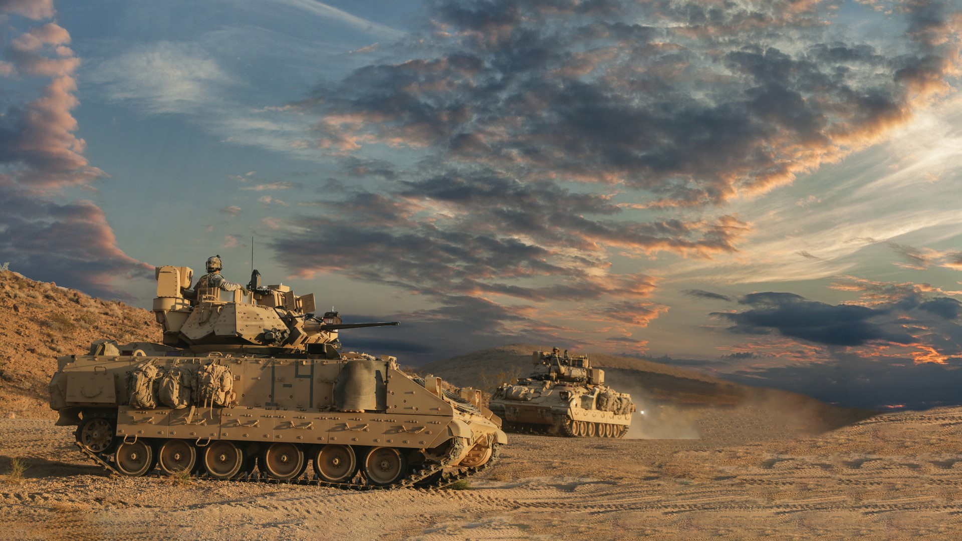 Defense vehicles in a desert
