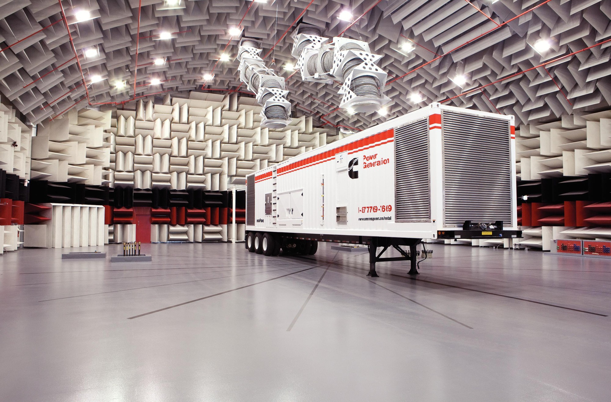 Participants take part in a tour of the Acoustical Testing Center and factory in Fridley, Minnesota (USA).