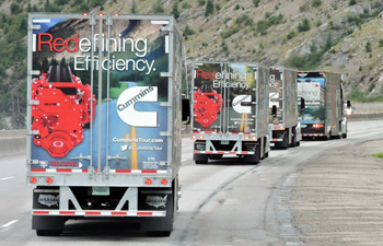 cummins-truck-convoy-trailers-mountain