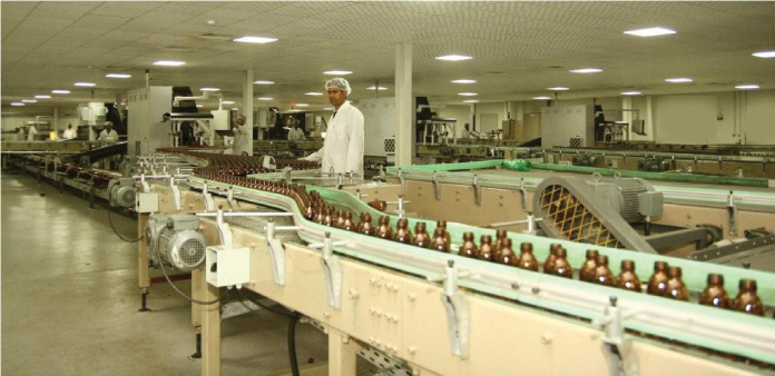 A 5 MW Cummins backup power system allows production to be Always On, such as this glass container line at Ghani Glass Limited.