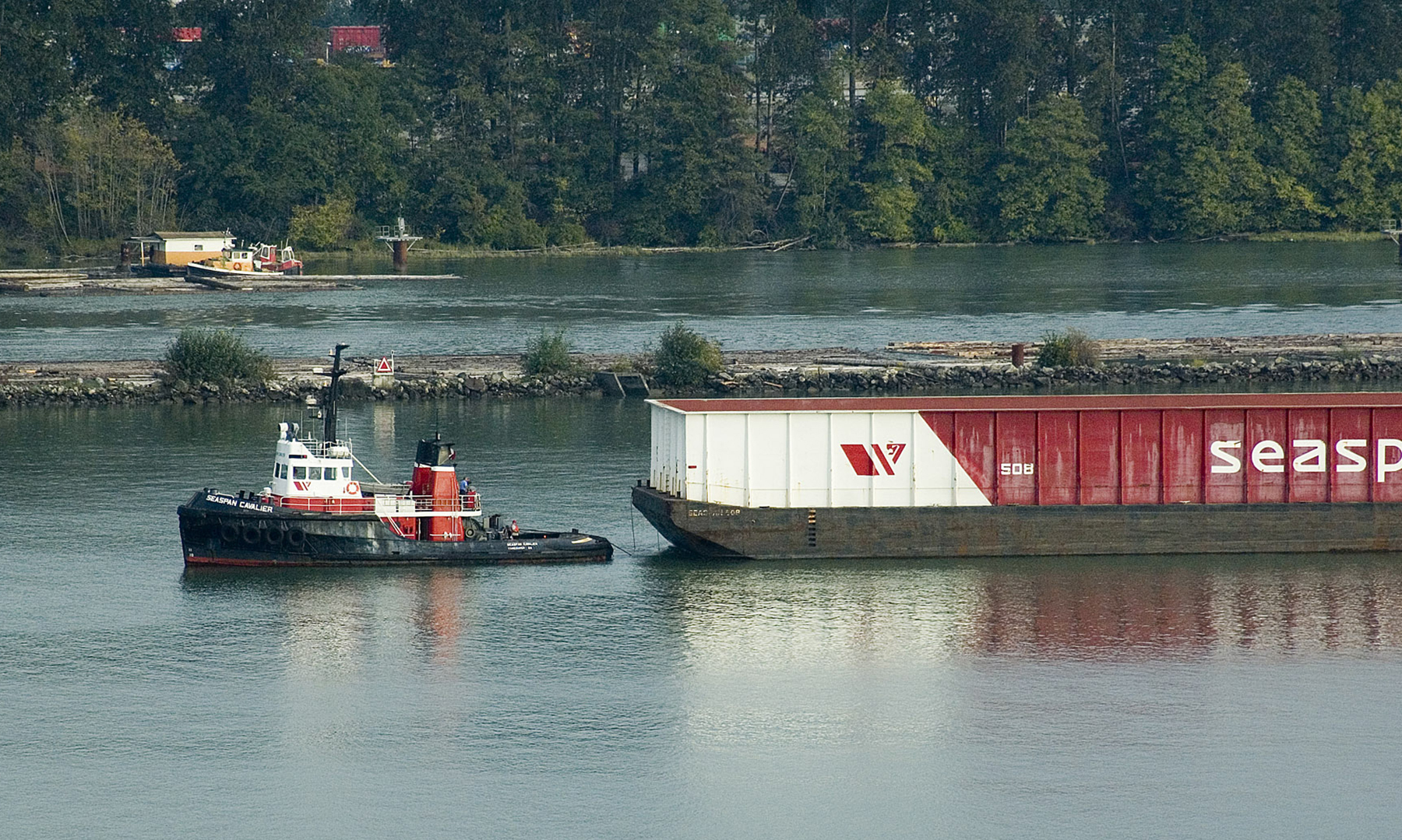 Seaspan Cavalier tugging cargo