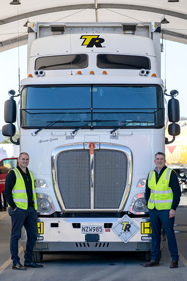 TR employees next to truck