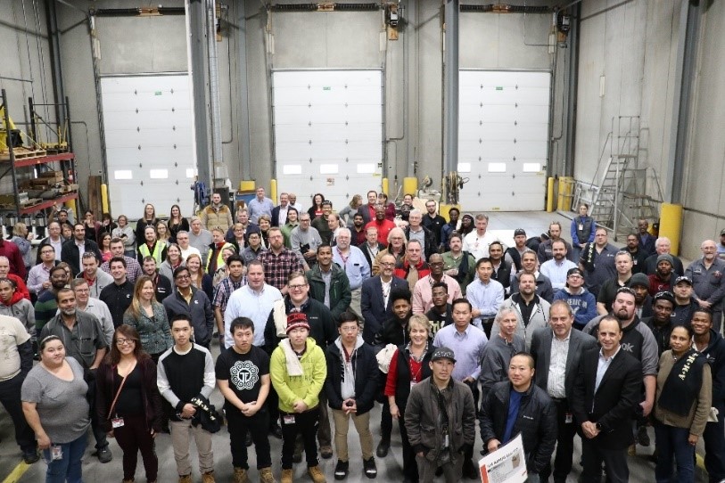 Cummins employees celebrate the 25,000th AMMPS unit produced in the Fridley, Minnesota plant.