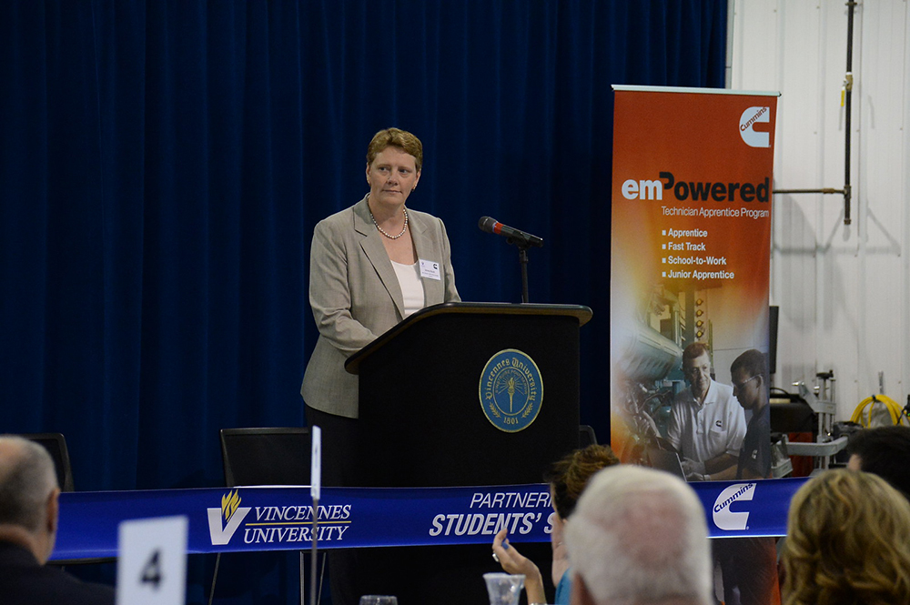 Jenny Bush, Executive Managing Director – North America Distribution, Cummins Inc., addresses students, faculty, media and local officials at Vincennes University as part of the Cummins/VU Technical Apprentice Program.