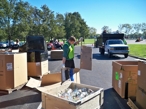 Employees gather recyclables at a previous Communitywide Recycle Day at the Cummins Engine Plant.