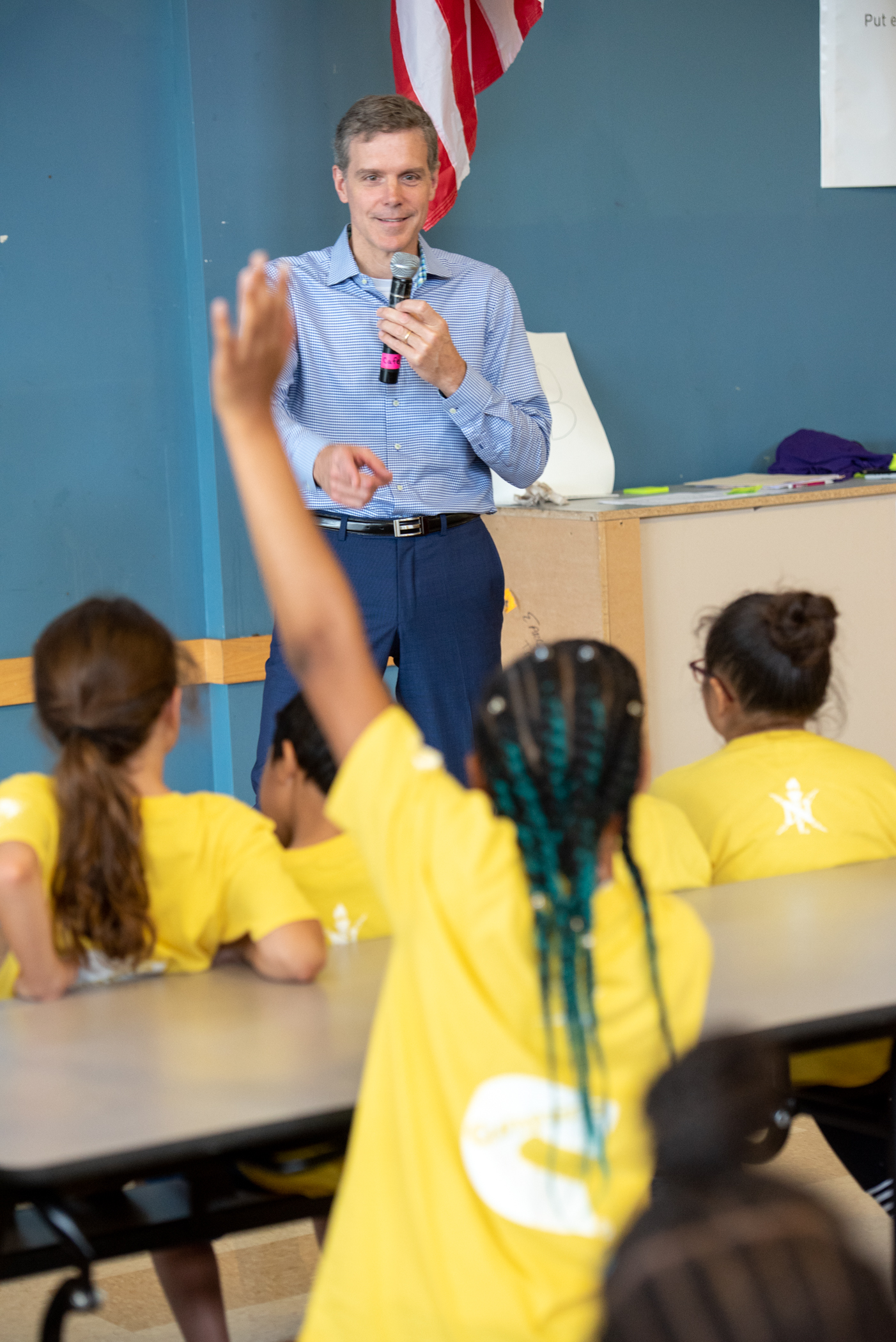 Executive Director of Power Systems Engineering Gary Johansen prepares to field a question from a young future engineer.