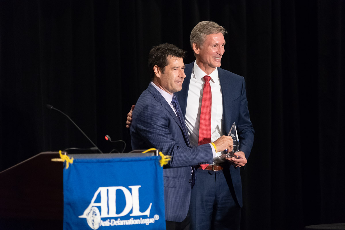 Tom Linebarger accepts award for Man of the Year from the Anti-Defamation League