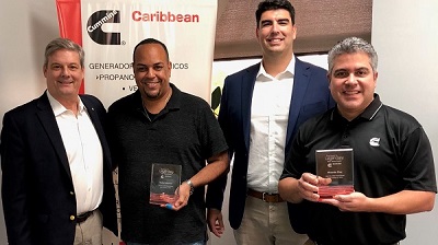 Legendary Sales Award winners Rafael Mitchell, second from left, and Ricardo Diaz, far right, are joined by David Hagewood, Vice President - Power Generation, far left, and Nabil Contreras, Caribbean Commercial Sales Director, second from right.