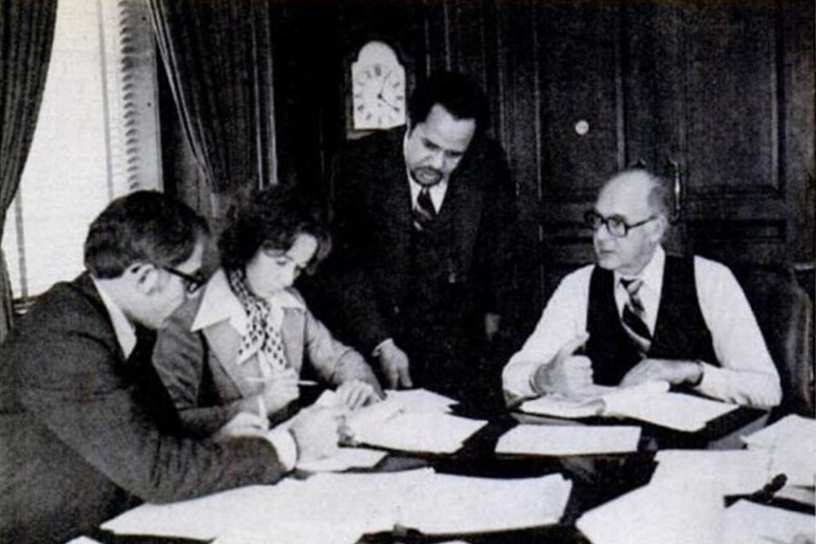 James Joseph working in a group with others