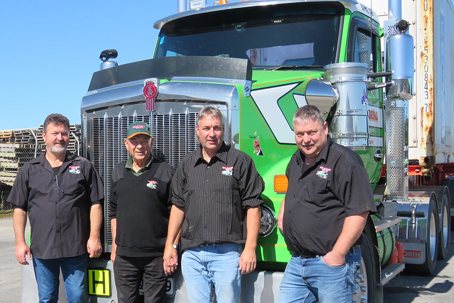 Uhlenberg family in front of truck