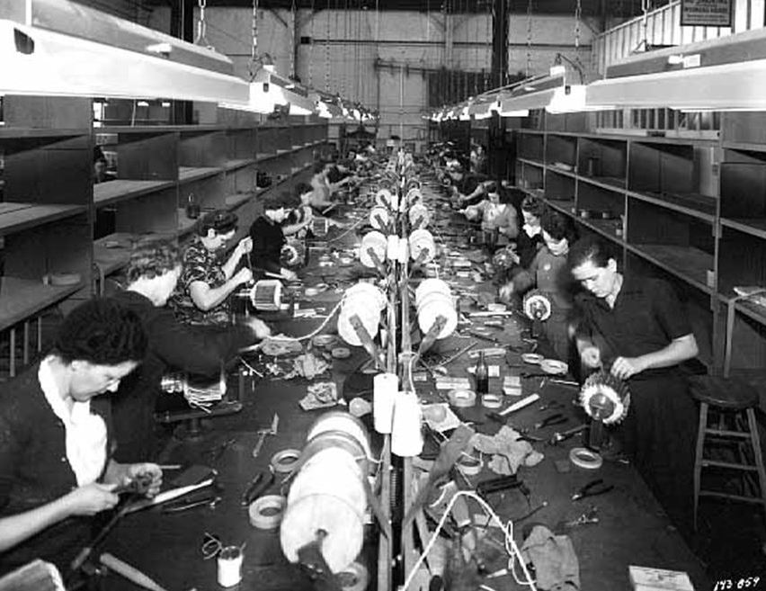 Employees of Onan Corporation winding armature at University Plant, Minnesota, U.S. in 1942 , during World War II. 