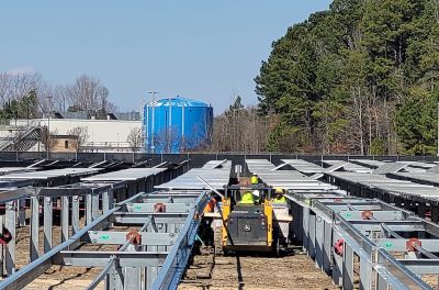 Crews install the solar panels at Cummins' Rocky Mount Engine Plant.