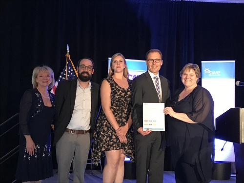 Penny Wirsing, SWE President, with Cummins employees Christopher Scott, Stefanie Medina, Ben Schilling and Cheryl Lavalley.