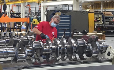 A Seymour Engine Plant employee at work