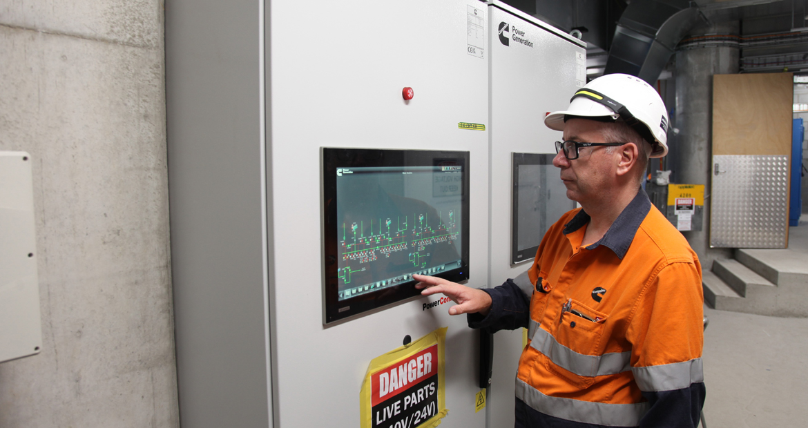 Application engineer Kevin Baxter checks one of the six Cummins digital master controllers.