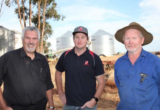 Ken Brain (right) with Cummins sales executive Adrian Melotto (left)  and Pumps, Pipes and Power owner John Byrne.