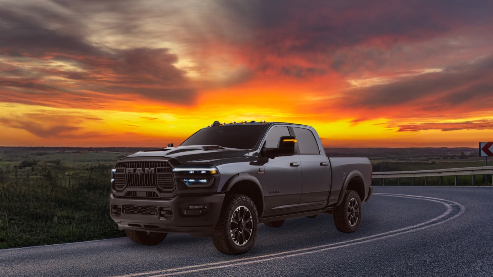 Ram truck with sun setting behind it