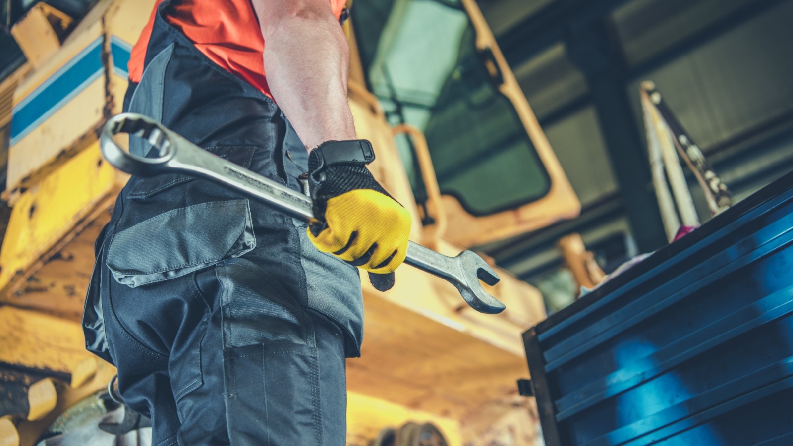 Worker with wrench
