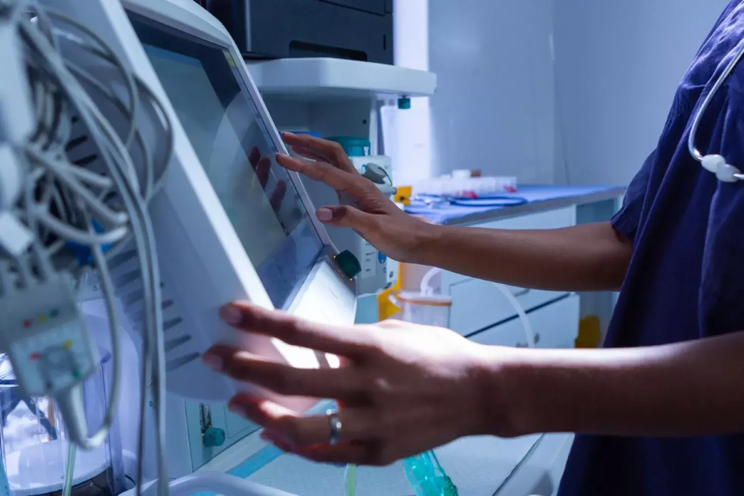 nurse using digital screen in medical center