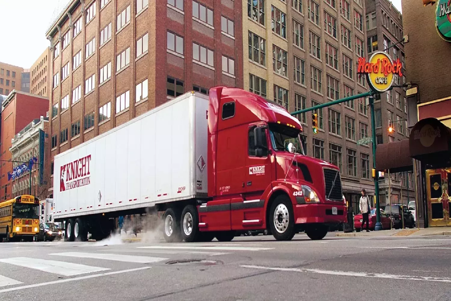 Knight truck in downtown of a city