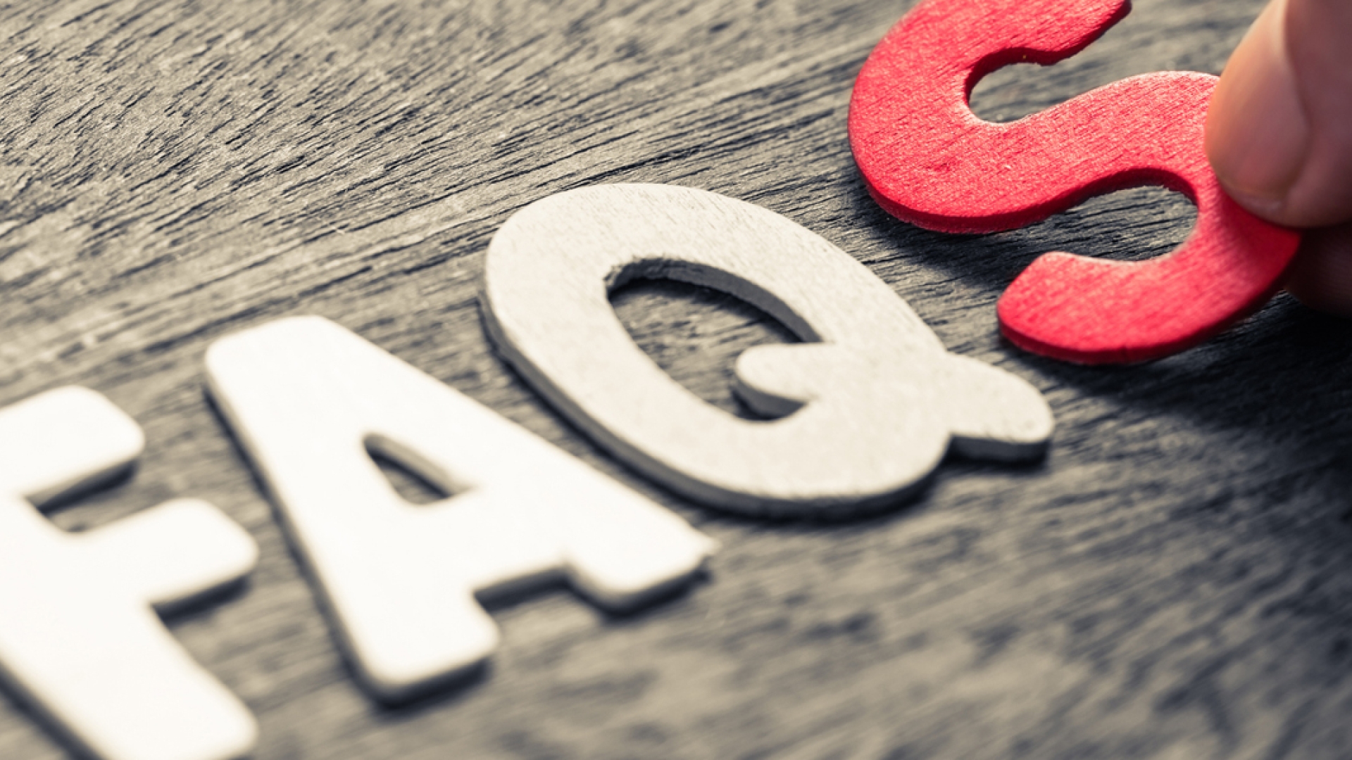 faq letters on table