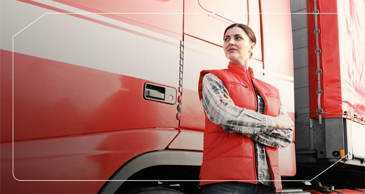 Woman posing in front of semi