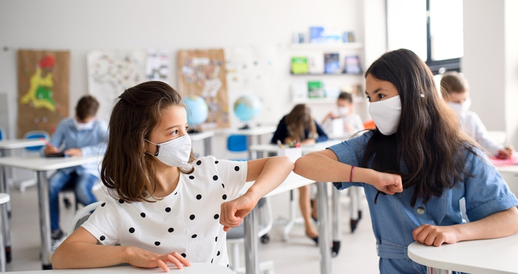 Girls wearing masks