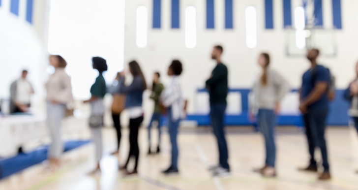 people line up and wait to vote