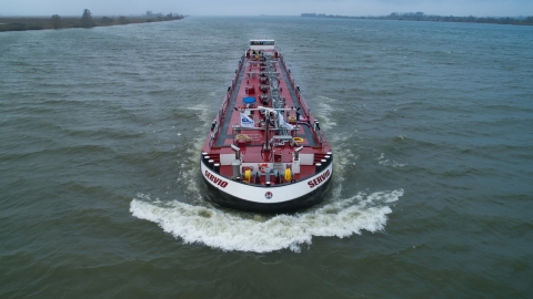 inland marine boat driving up river