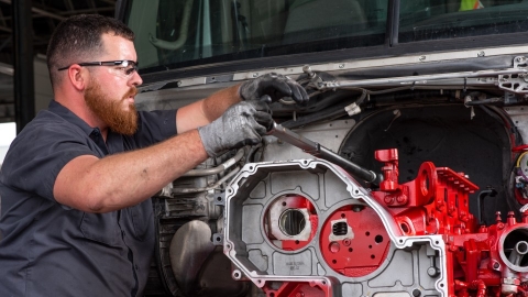 technician working on engine