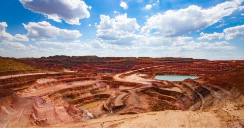 desert landscape with blue skies in the background