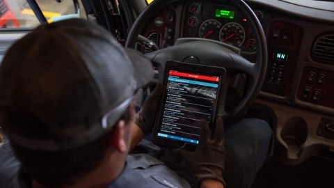 technician using electronic tools