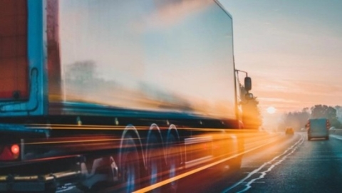 Truck driving fast on highway