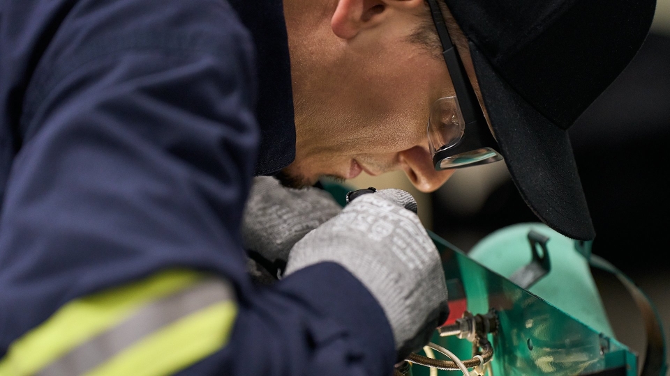 technician servicing generator