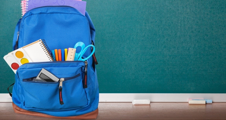 School backpack on desk