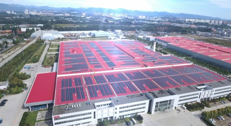 The Beijing Foton Cummins Engine Plant (above) in Beijing, China, is the largest of Cummins’ 12 completed solar installations. Work will begin soon on the plant’s second building (upper right).