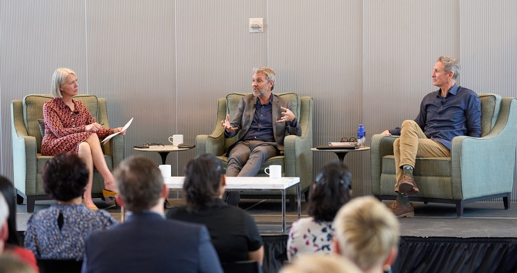 Mary Chandler moderating a panel with Tom Linebarger and Gary Barker, CEO of Promundo-US