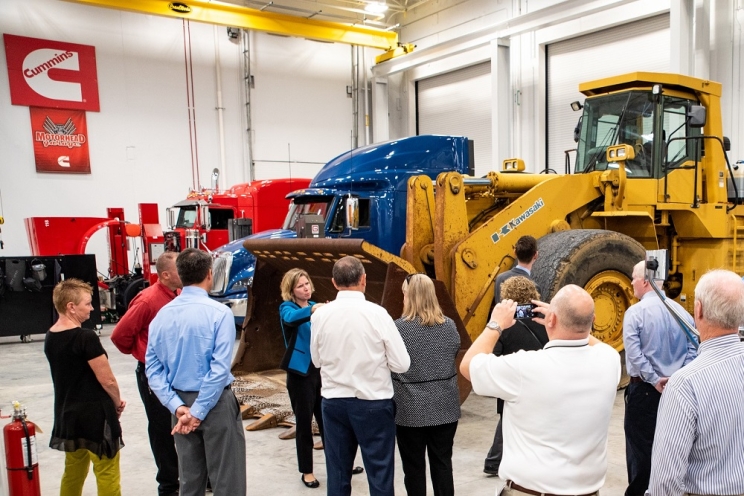 Vice President and Chief Technical Officer Jennifer Rumsey leads a tour at the new Cummins Machine Integration Center.