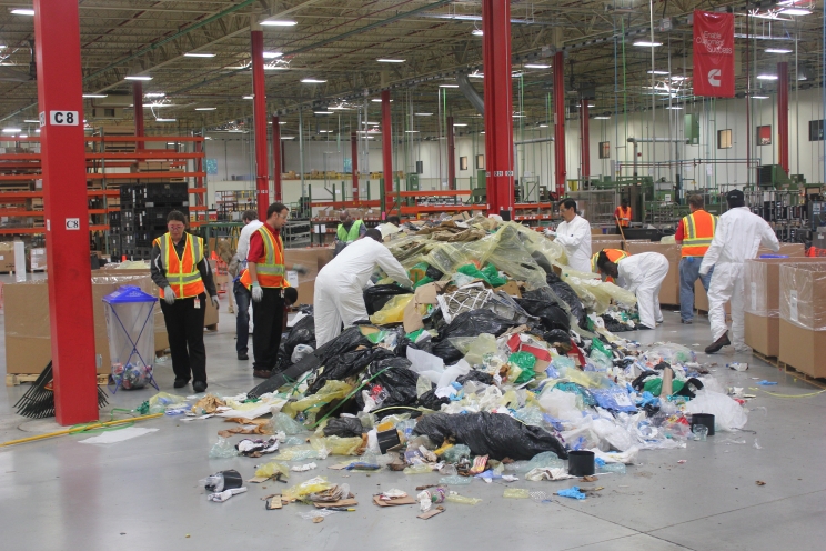 Cummins employees in Charleston, South Carolina, performed a dumpster dive to learn more about their waste stream during a previous celebration of June Environmental Month.