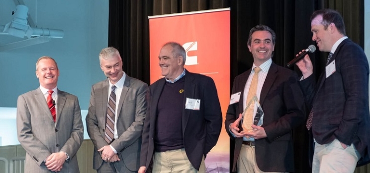 The winning team from BBC Pump and Equipment Co. Inc. is joined on stage by Cummins' Denis Ford (far left) and Jim Gruwell (second from left) at the first Cummins U.S. Innovation Gateway.