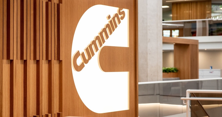 white Cummins logo at entrance of corporate office
