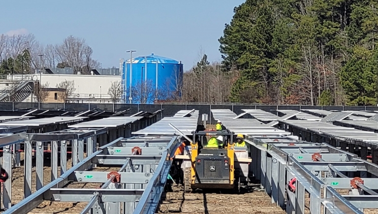 Crews work on the solar array at the Cummins Engine Plant in Rocky Mount, N.C.