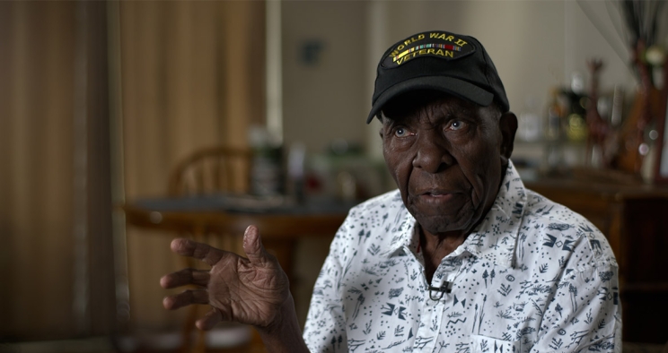102-year-old World War II Veteran Ray Robinson smiling