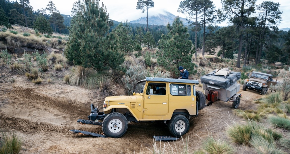 The Clean Cruiser Project’s re-powered Land Cruisers with Pico de Orizaba in the background on what would be a harrowing trip up the mountain.