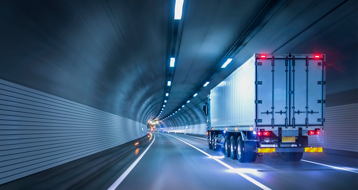 Semi driving through tunnel